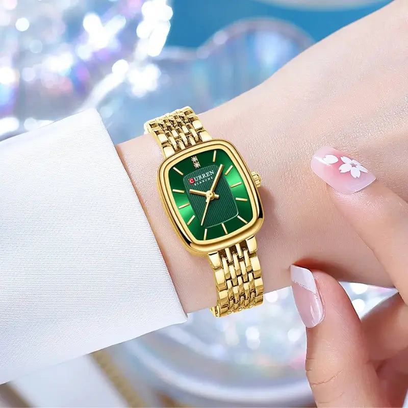 Relógio retangular dourado com mostrador verde para mulher