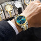 Relógio de luxo prateado e dourado com mostrador azul para homem